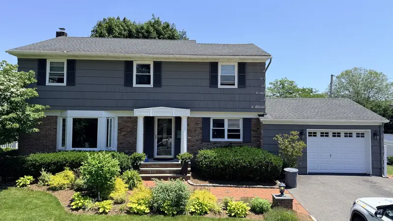 Syosset home after a full exterior repaint by Walker Painting