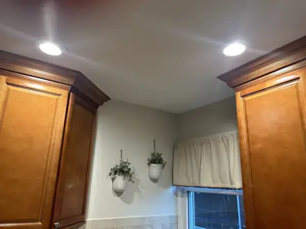 The same kitchen ceiling after Walker Painting&rsquo;s repair and repaint