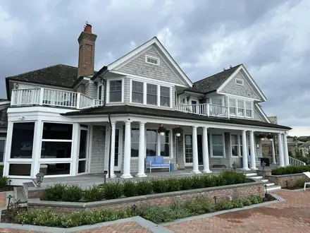 Westhampton Beach exterior before Walker Painting&rsquo;s repairs and repaint